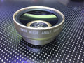 Set of three smartphone camera lenses (wide angle, macro, fisheye) with a universal clip and a zip case.