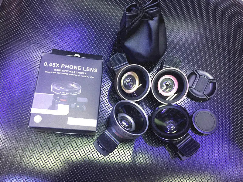 Set of three smartphone camera lenses (wide angle, macro, fisheye) with a universal clip and a zip case.