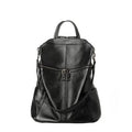 Brown genuine leather retro women's backpack with front pocket and adjustable straps.
