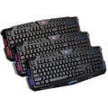 Black backlit game crack keyboard with red, purple, and blue adjustable lighting and anti-slip base
