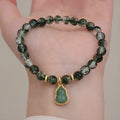 Women's citrine crystal bracelet with green ghost calabash heart pendant and pearl accents