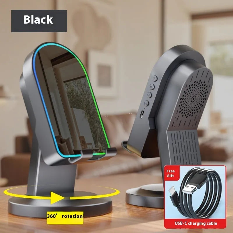 Three-in-one wireless induction Bluetooth speaker bracket with phone holder, black colour, mirror finish, showing USB port and built-in battery