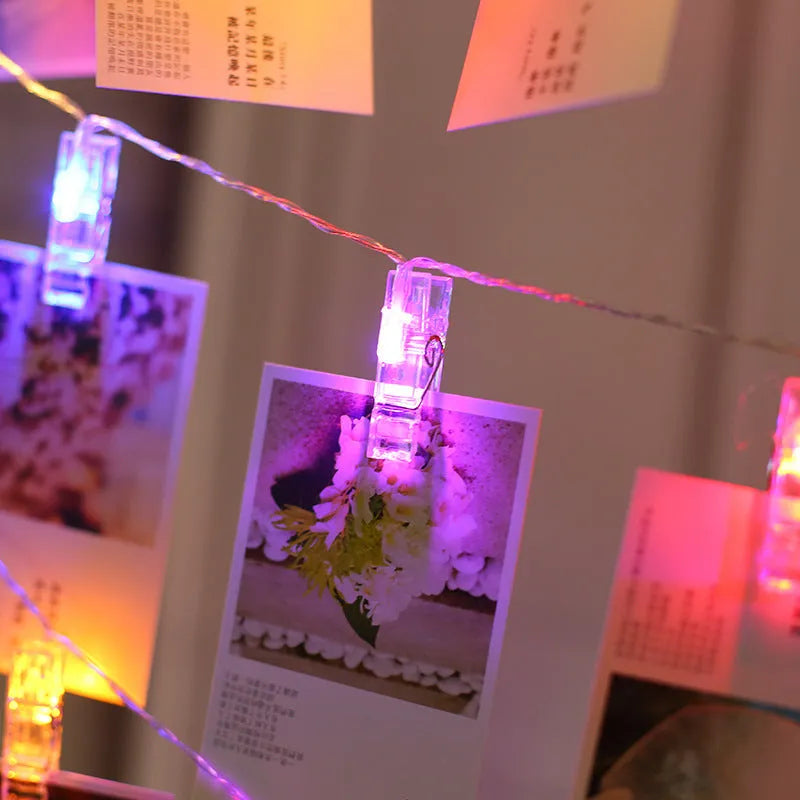 LED clip light string with heart-shaped warm white bulbs spaced 15cm apart