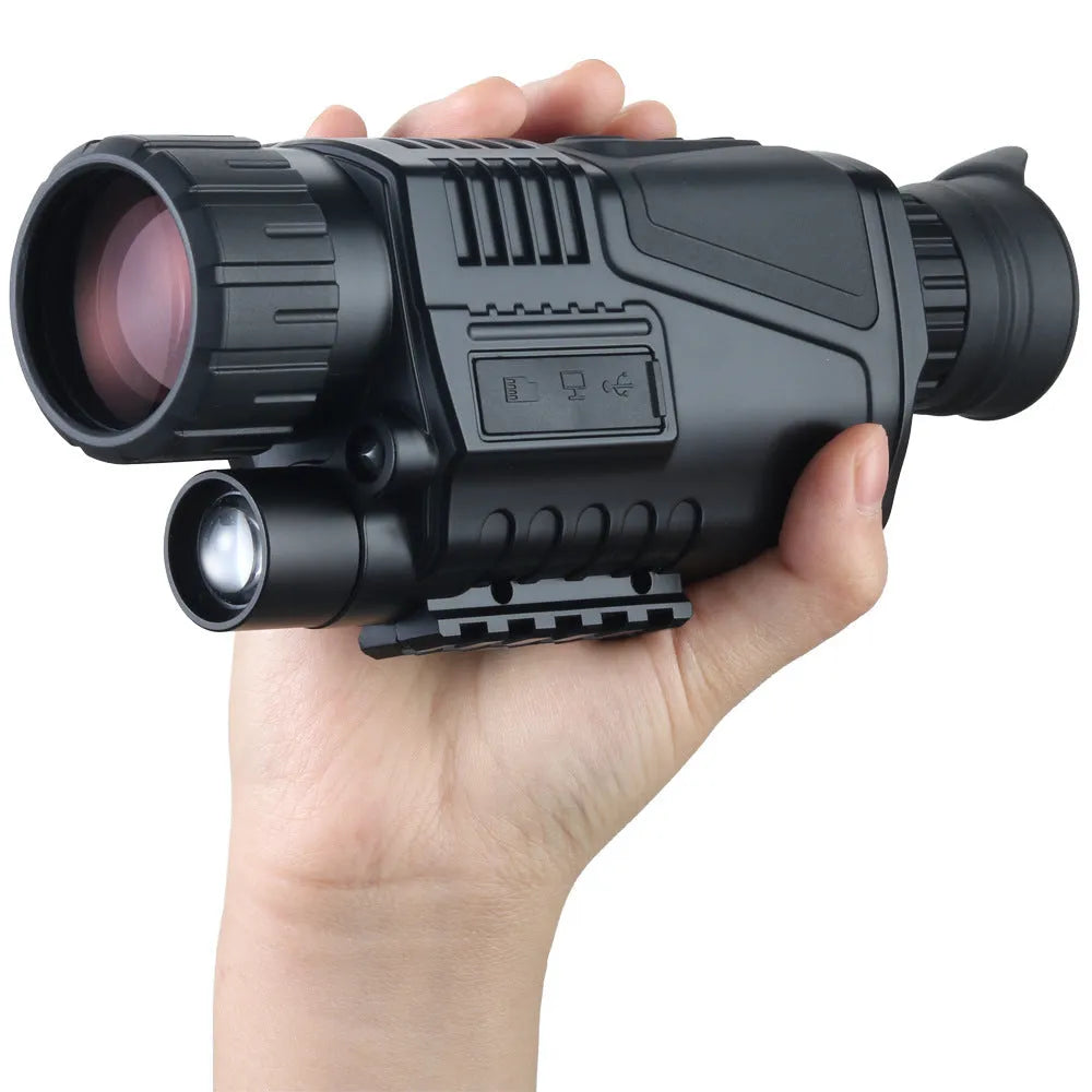 NV300 colour digital night vision telescope with storage bag and cables on a table.