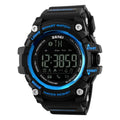GIMTO sports health smart watch for men with round 50mm dial, stainless steel case, and blue silicone strap on a wrist