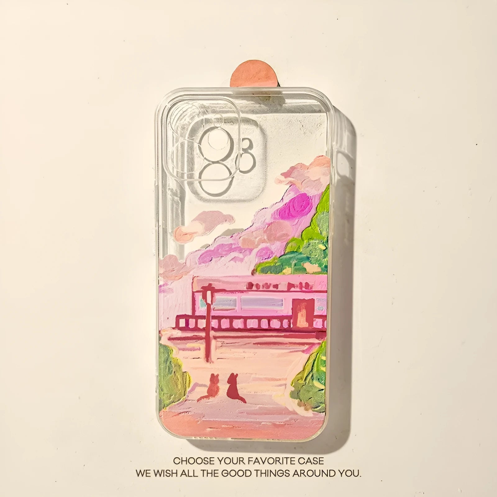 Soft silicone iPhone case with a colourful two cat cartoon design on the back