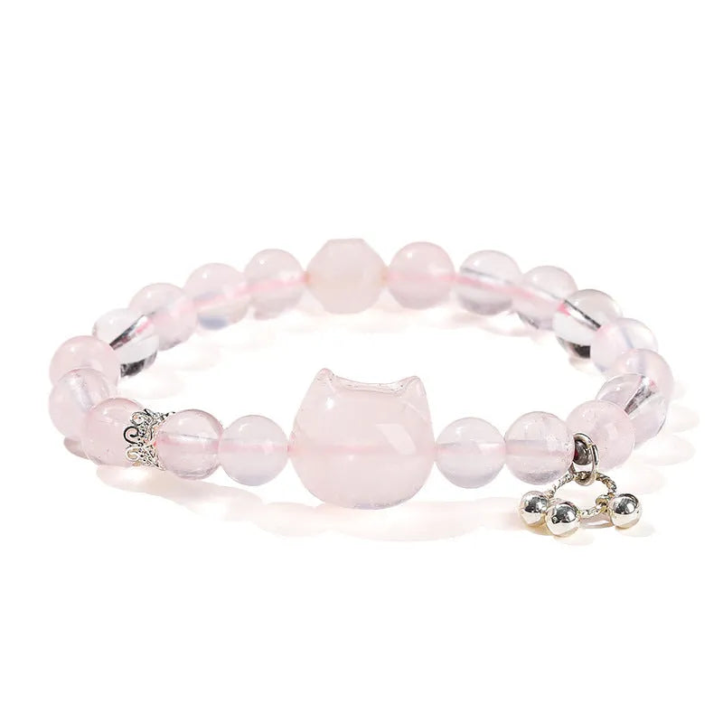 Women's handmade crystal cat head bracelet with natural star light pink crystal and copper geometric setting