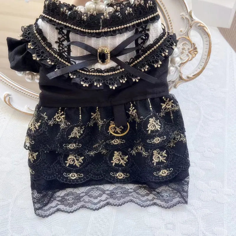 Golden gothic-style skirt outfit on a small dog, showing princess cut and sizing for pets.