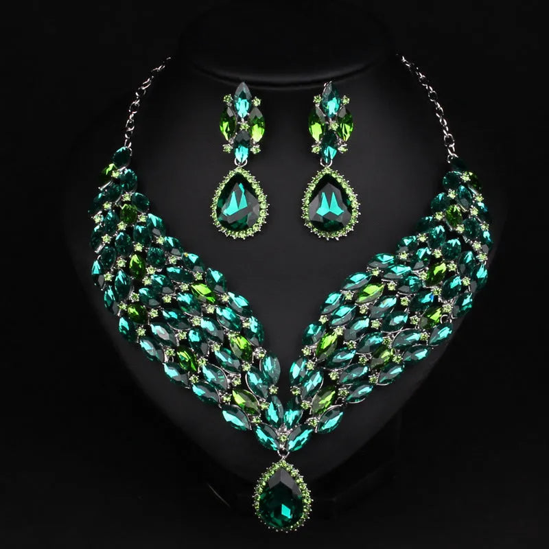 Full drill bridal clavicle chain necklace set with matching accessories in champagne and green on white background
