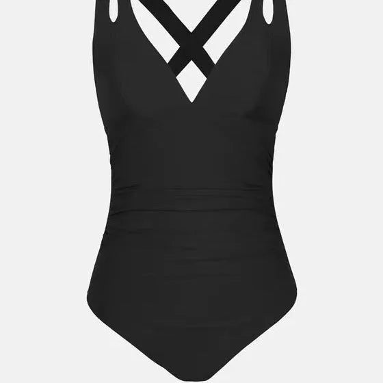 Solid colour one-piece swimsuit with triangle bikini top and cross-back shoulder straps