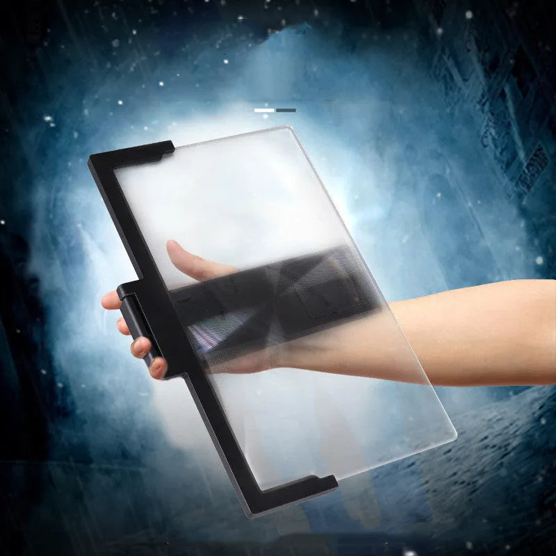 A black magnifying mobile phone stand holding a smartphone, showing the enlarged screen through the acrylic lens.