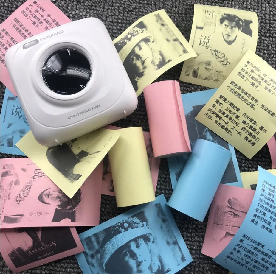 PerPage mini wireless portable thermal printer paper roll in multiple colours, showing label and sticker options