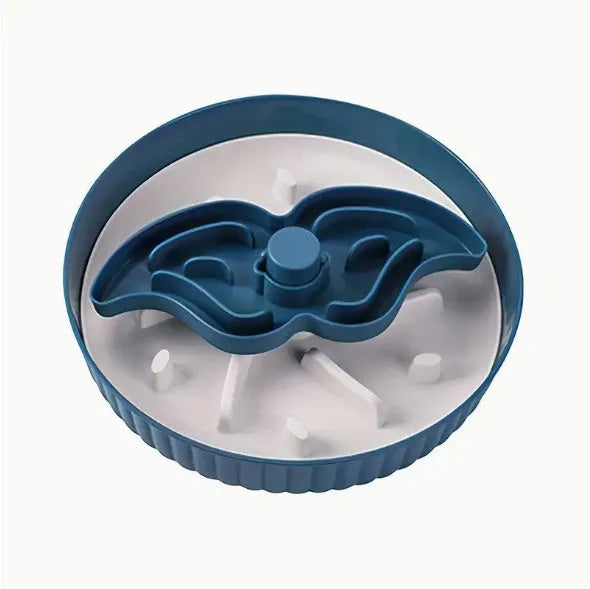 Interactive rotating slow-feed dog bowl with blue silicone licking mat in a windmill pattern.