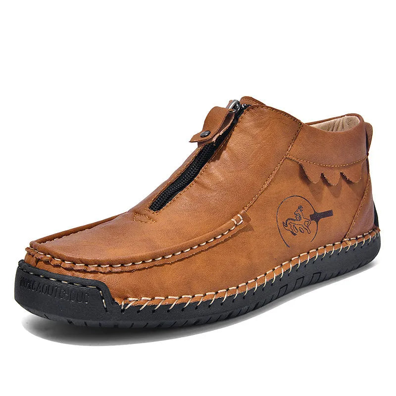Men's black slip-on loafers with a round toe and low rubber sole.