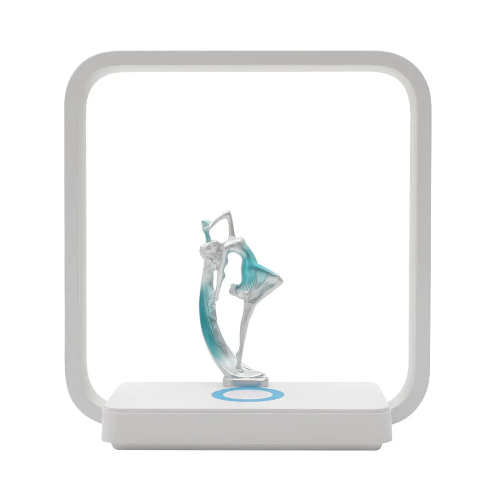 Blue atmosphere table lamp with integrated wireless phone charging pad on bedside table