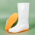 White plastic rain boots with high tube design and flat heel for outdoor labour protection