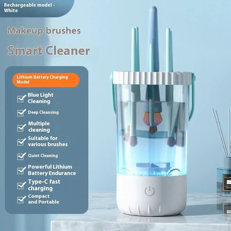 White rechargeable electric makeup brush cleaning device with USB cable.