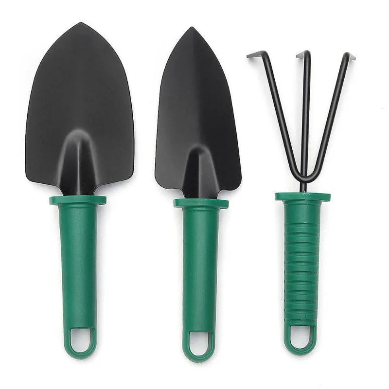 Camouflage garden tool set with two shovels, rake, scissor, kettle, and spray bottle in a green plastic case