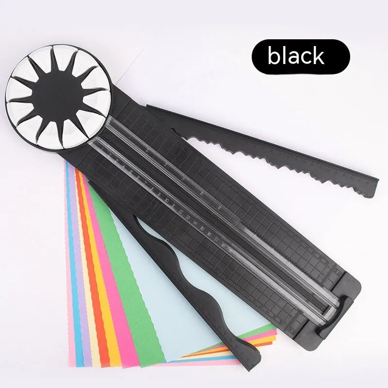 Pink and black 12-in-1 multifunctional plastic paper cutting machine for crafts.