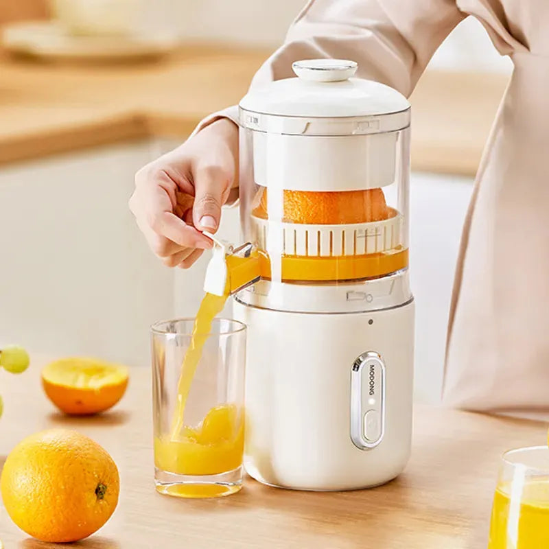 Green portable electric fruit juicer with USB-C charging and automatic pressing mechanism
