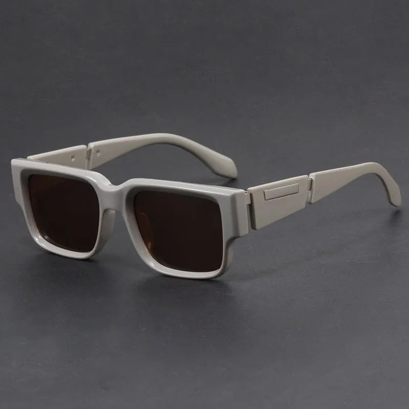 Retro square thick frame sunglasses with blue frame and gray blue lenses.