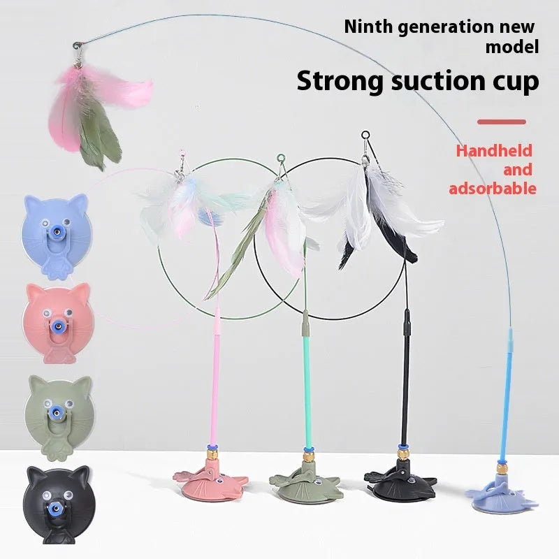 Cat teaser stick toy with suction cup base and colourful interchangeable head attachments