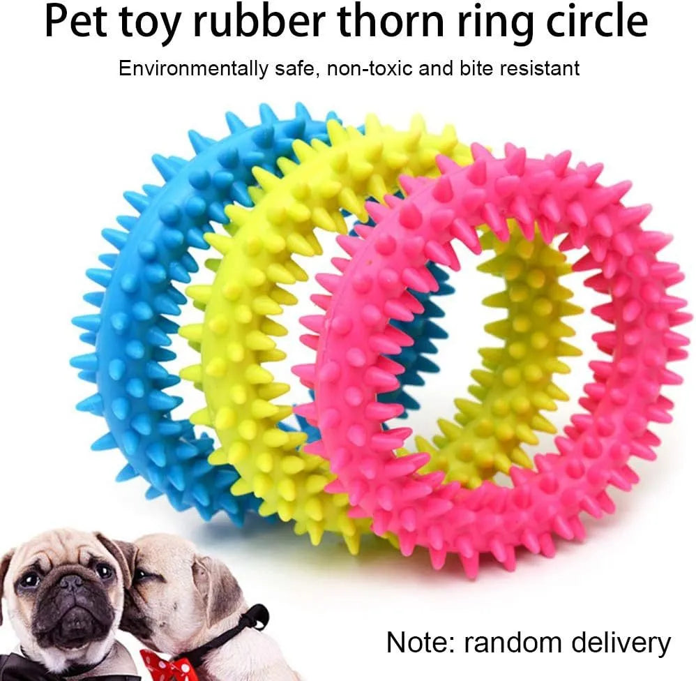 Blue TPR spiky circle ring dog chew toy for teeth cleaning on a white background.
