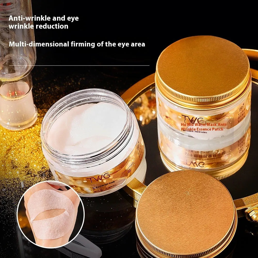 Box of snail essence paste eye mask containing 40 individual tablets for dark circles and fine lines.