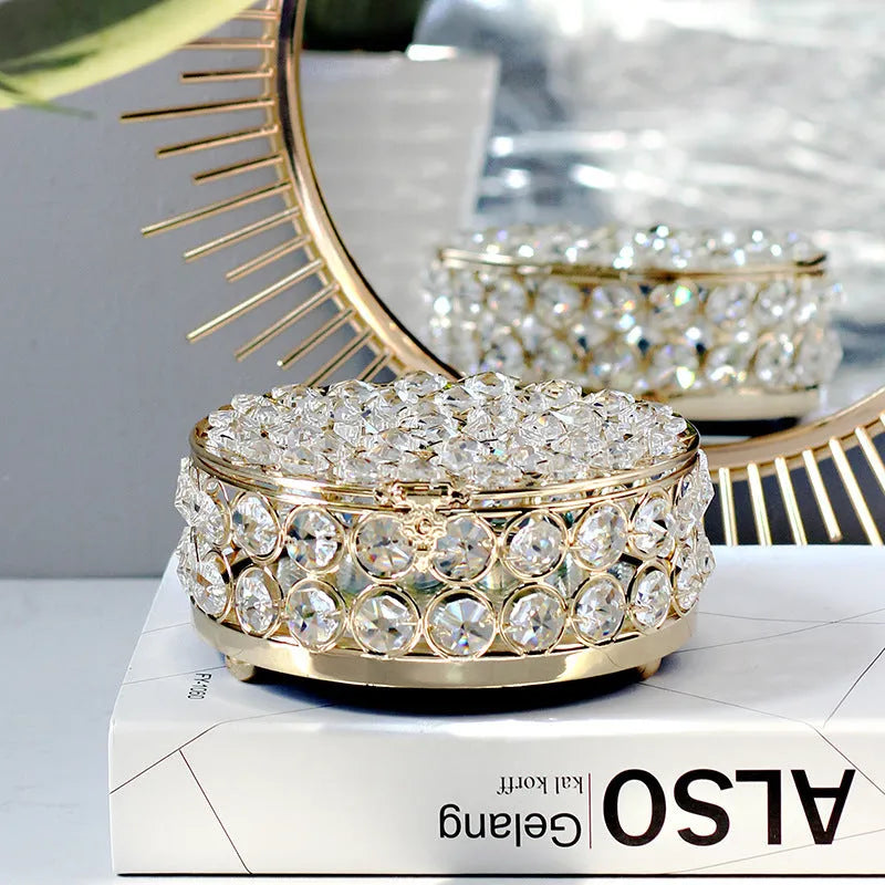 Clear crystal glass jewellery storage box with a French gold-coloured metal frame.