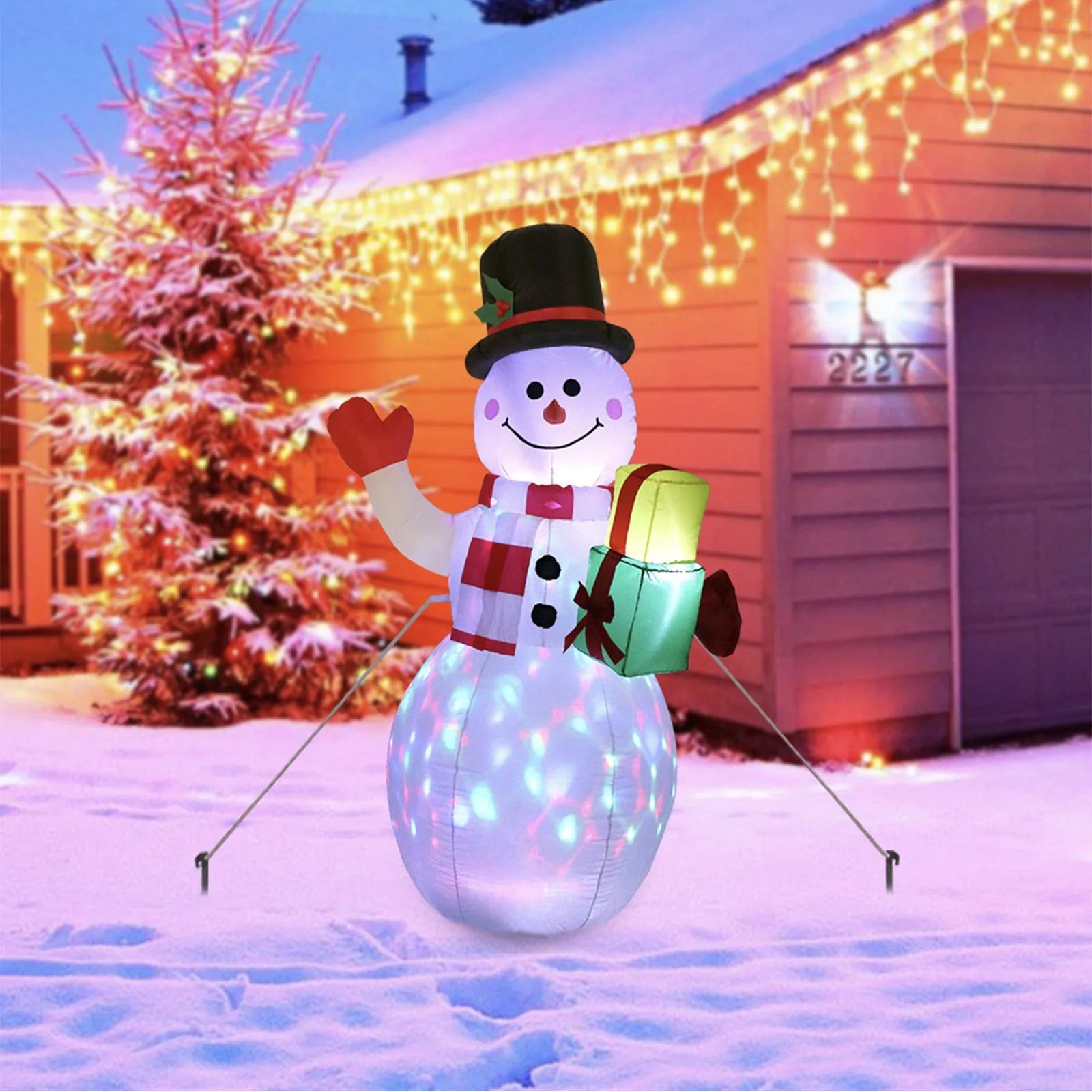 Outdoor Christmas inflatable decoration with LED lights showing Santa, snowman or tree designs