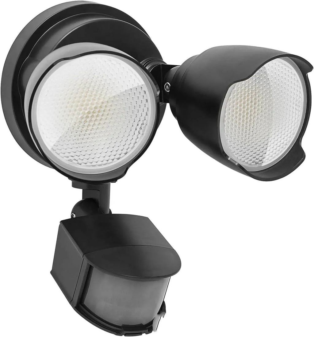 White LED security flood light with motion sensor mounted on an exterior wall