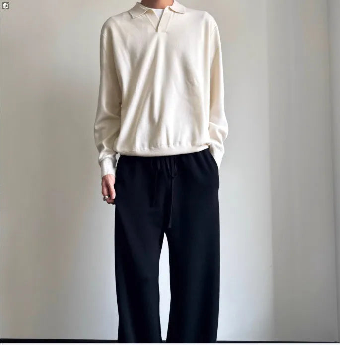 Man's pure wool polo sweater with a lapel collar in loose fit, shown in Milky White colour.