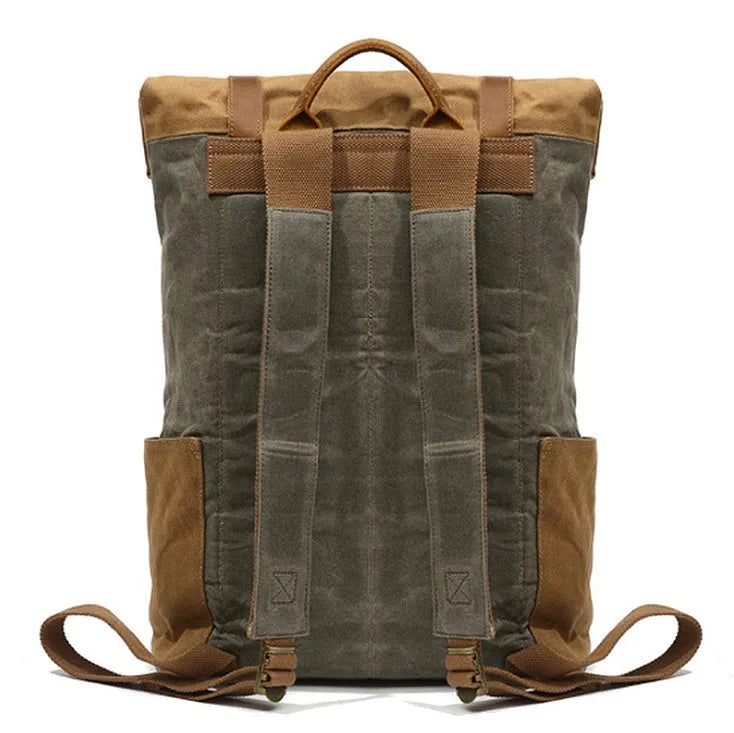 Canvas vintage backpack in khaki showing front zipper pocket and curved shoulder straps with retro square shape