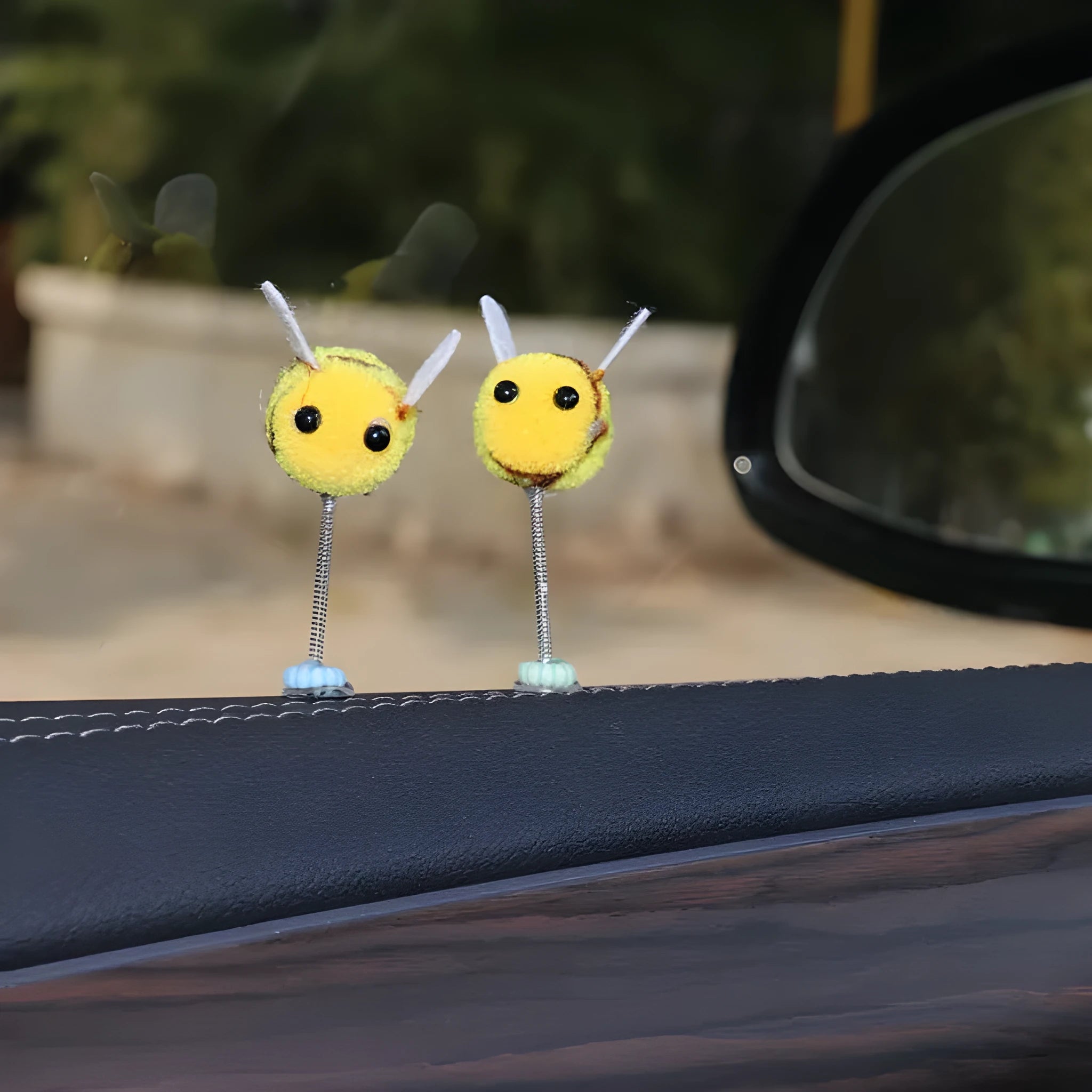 Swing Spring Bee car decoration with fur ball material and cartoon design measuring 3x3 cm