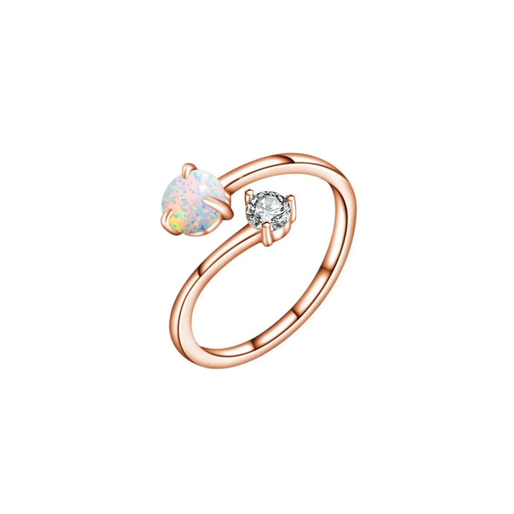 Open ring with adjustable opening, silver band, and inlaid zircon stones in gold colour