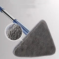 Blue extendable triangle cleaning mop with rotating head and stainless steel pole on a tiled floor.