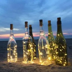 Flexible copper wire LED string lights with 20 warm white bulbs and plastic bottle stopper for wine bottle decoration