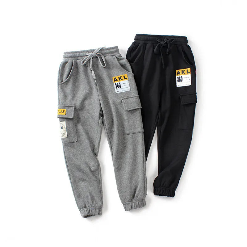 Boys' cotton track pants in black and grey, sizes 120-160cm, with elasticated hips