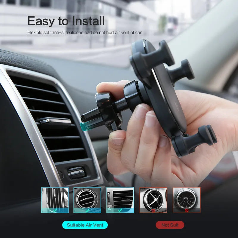 Black car mobile phone holder with gravity bracket mounted in vehicle air vent showing 360-degree rotation