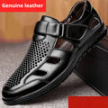 Men's black business casual sandals with hollow perforated design and Velcro fastening