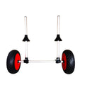 Foldable aluminium kayak beach trolley with solid rubber tyres, shown carrying a blue kayak on sand.