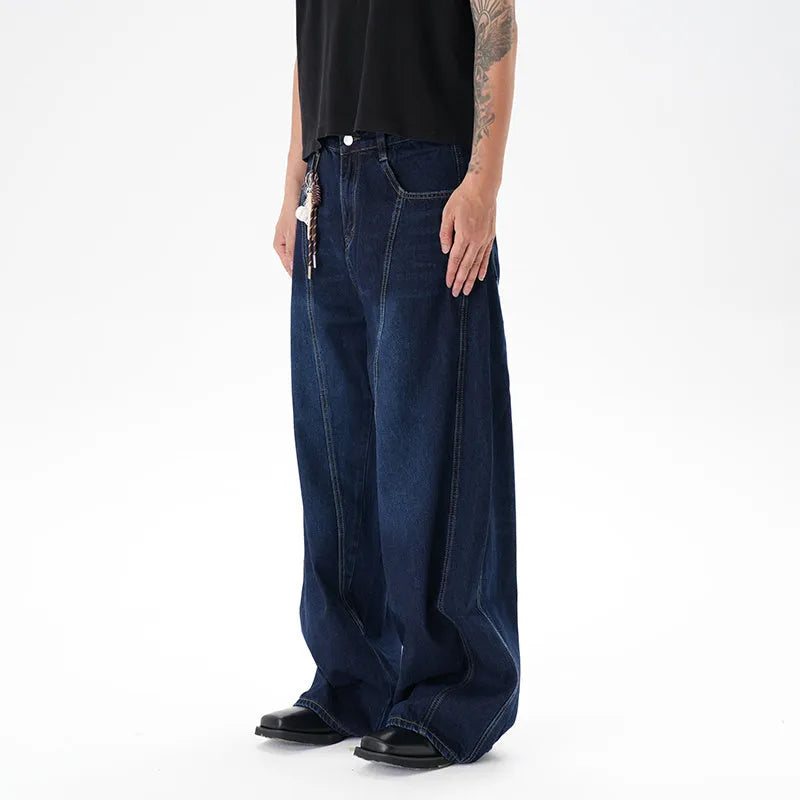 Women's washed distressed dark blue wide leg machete jeans on hanger