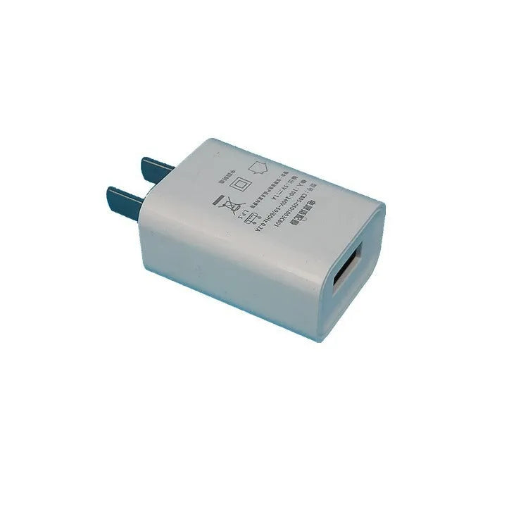 White 5V 1A USB wall charger with CE FCC marks for China Unicom M1/S phones.