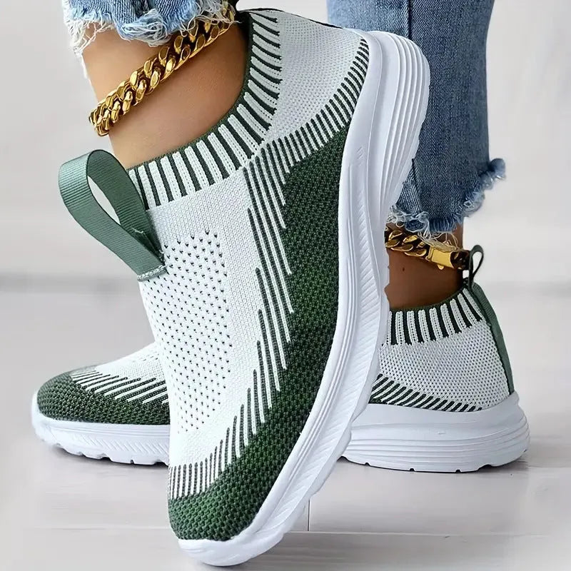 Women's casual sports shoes with breathable mesh upper in solid colour, side view