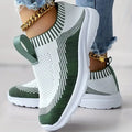 Women's casual sports shoes with breathable mesh upper in solid colour, side view