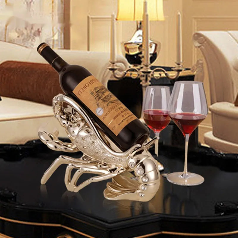 Lobster-shaped wine rack ornament in rose gold or silver holding wine bottle