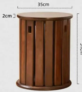 Set of four stackable iron dining stools with circular seats in a modern design, shown nested together.