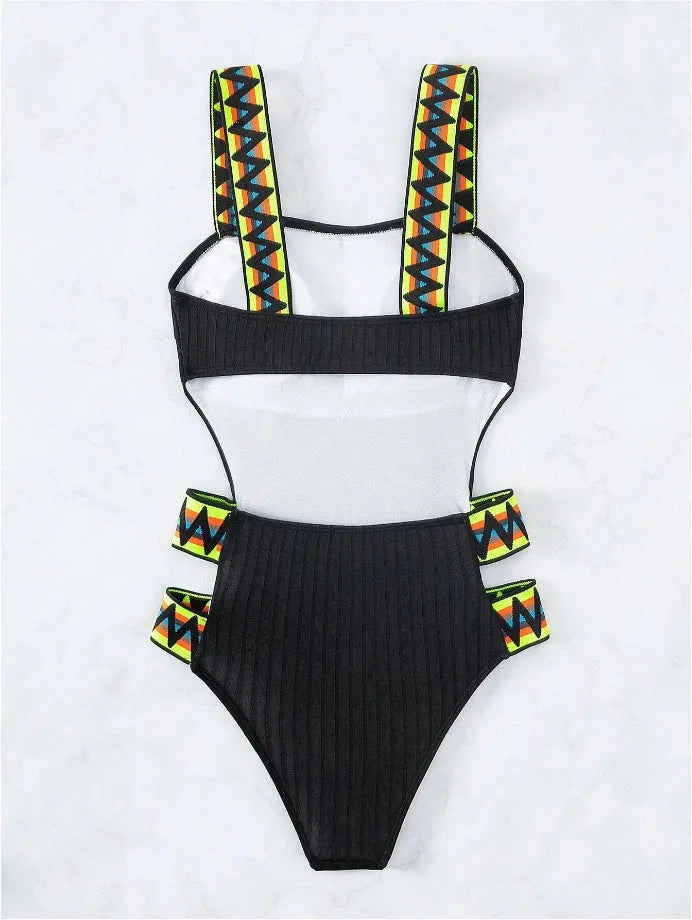 Solid colour black women's one-piece swimsuit made from polyester fabric on a neutral background.