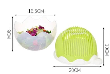 Blue salad cutter bowl showing removable cutting lid placed on a base with a raised rim.