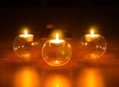 Handmade hollow glass sphere centrepiece in European style, shown in round form on table